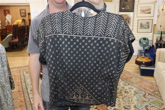 An Egyptian metal and net top and a black all-in-one trousers (2)